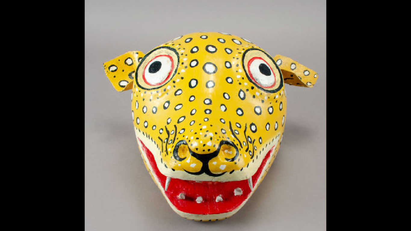 Folk Art Online-01 Sculpture of yellow creature head